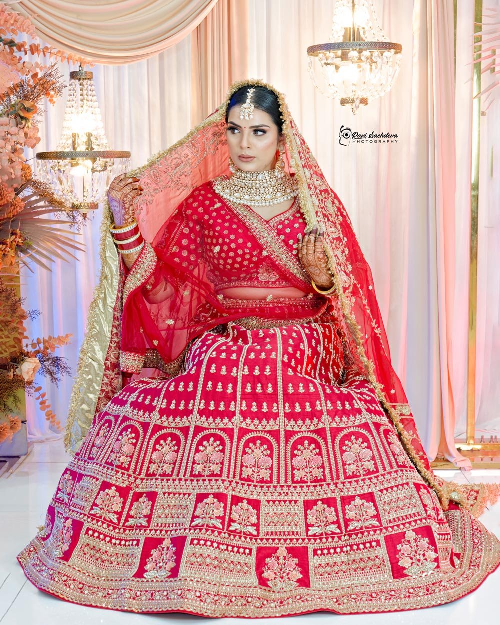 Traditional Indian bride in red and gold wedding attire full body portrait - Indian weddings in Melbourne